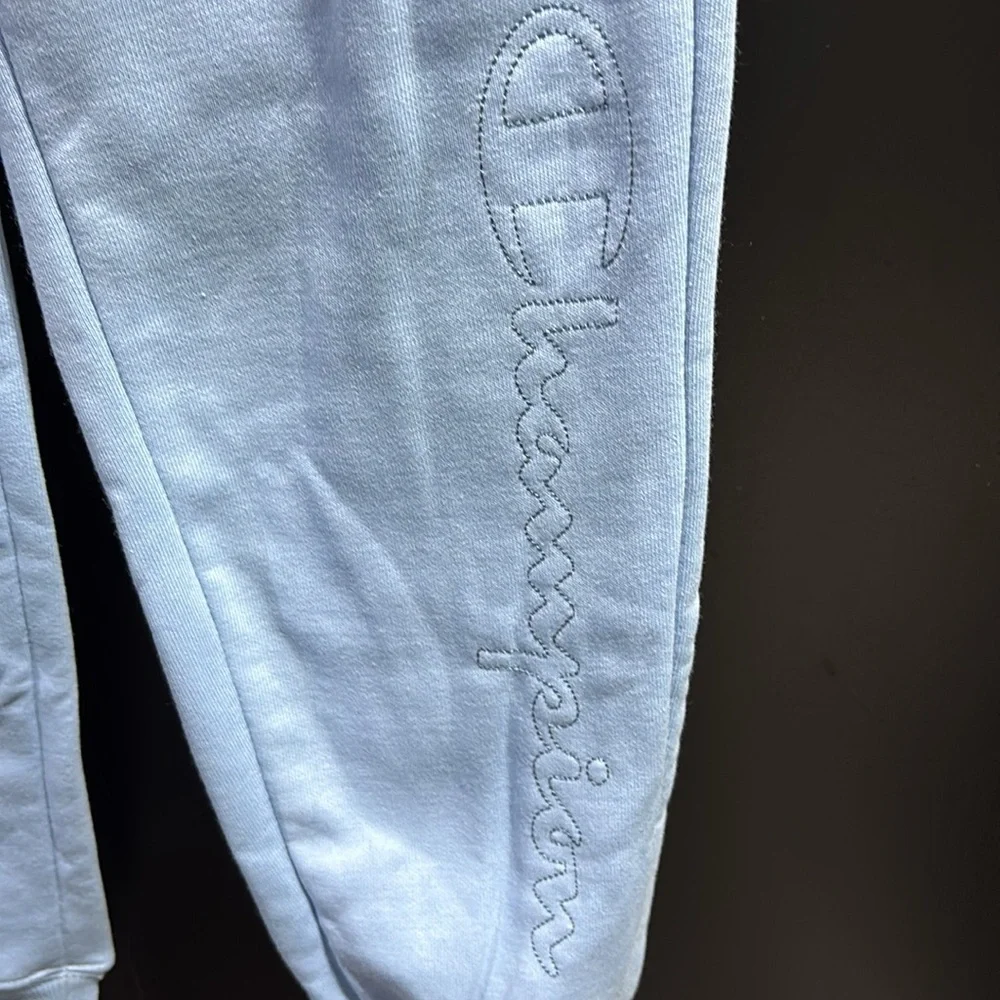 Champion Joggers,elastic waist,hip pockets,rib knit cuff, fleece lined,logo